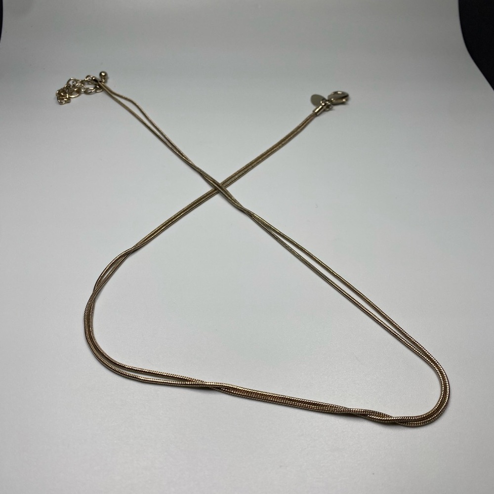 Chicos double strand gold toned necklace.
